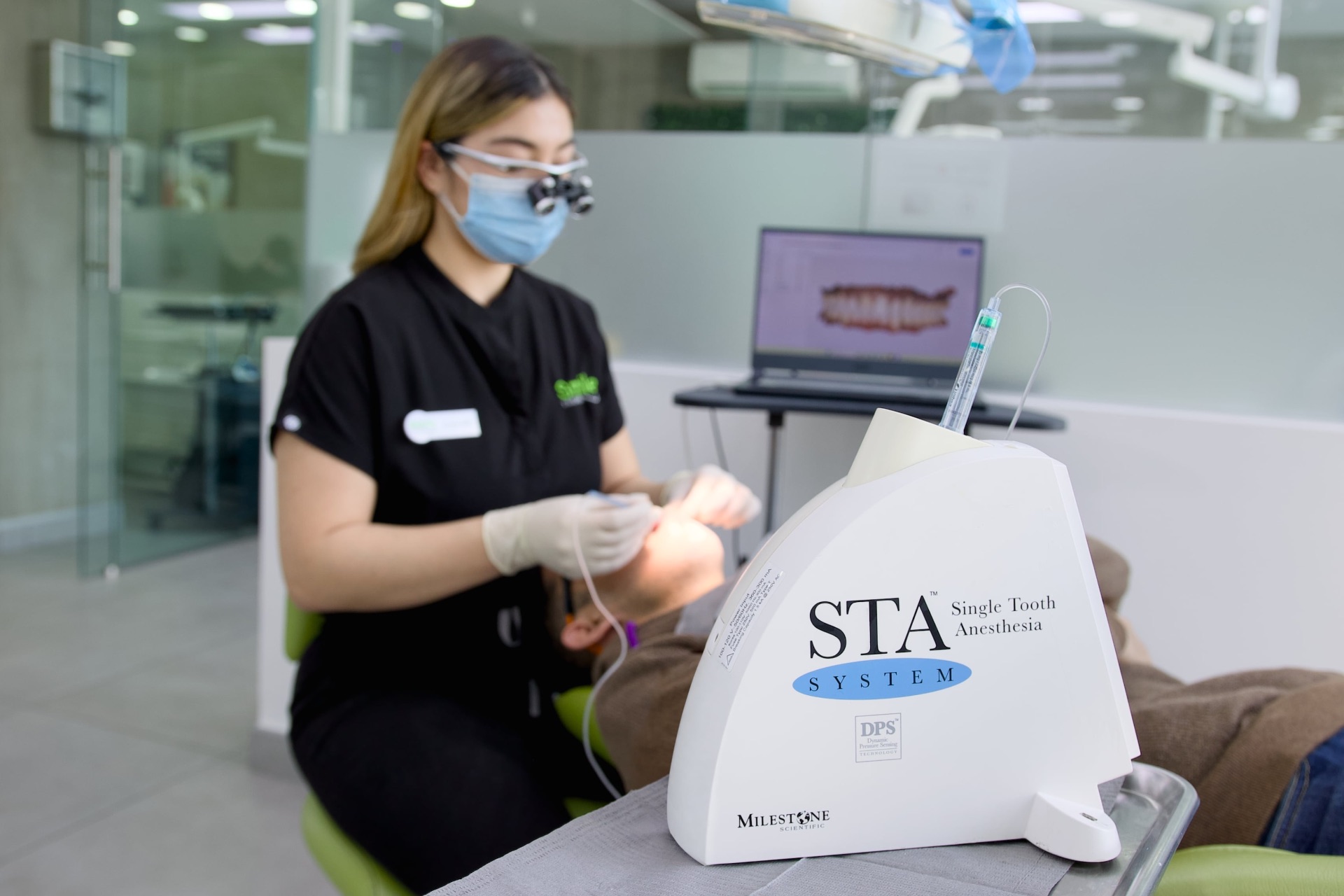 Smile Tijuana dentist using the STA Single Tooth Anesthesia system
