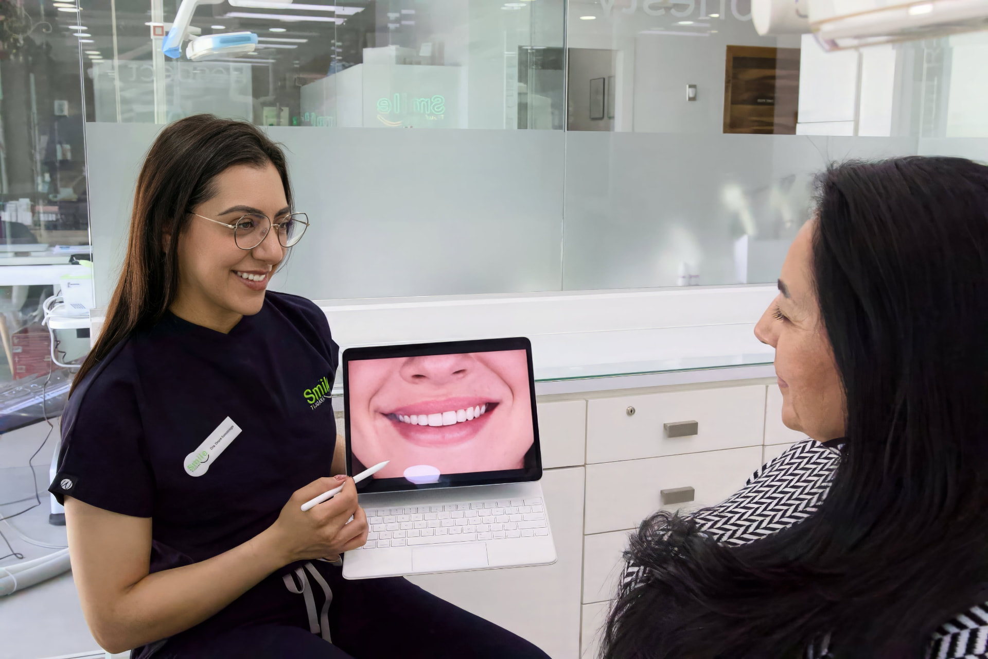 Smile Tijuana dentist showing a digital smile design to a patient